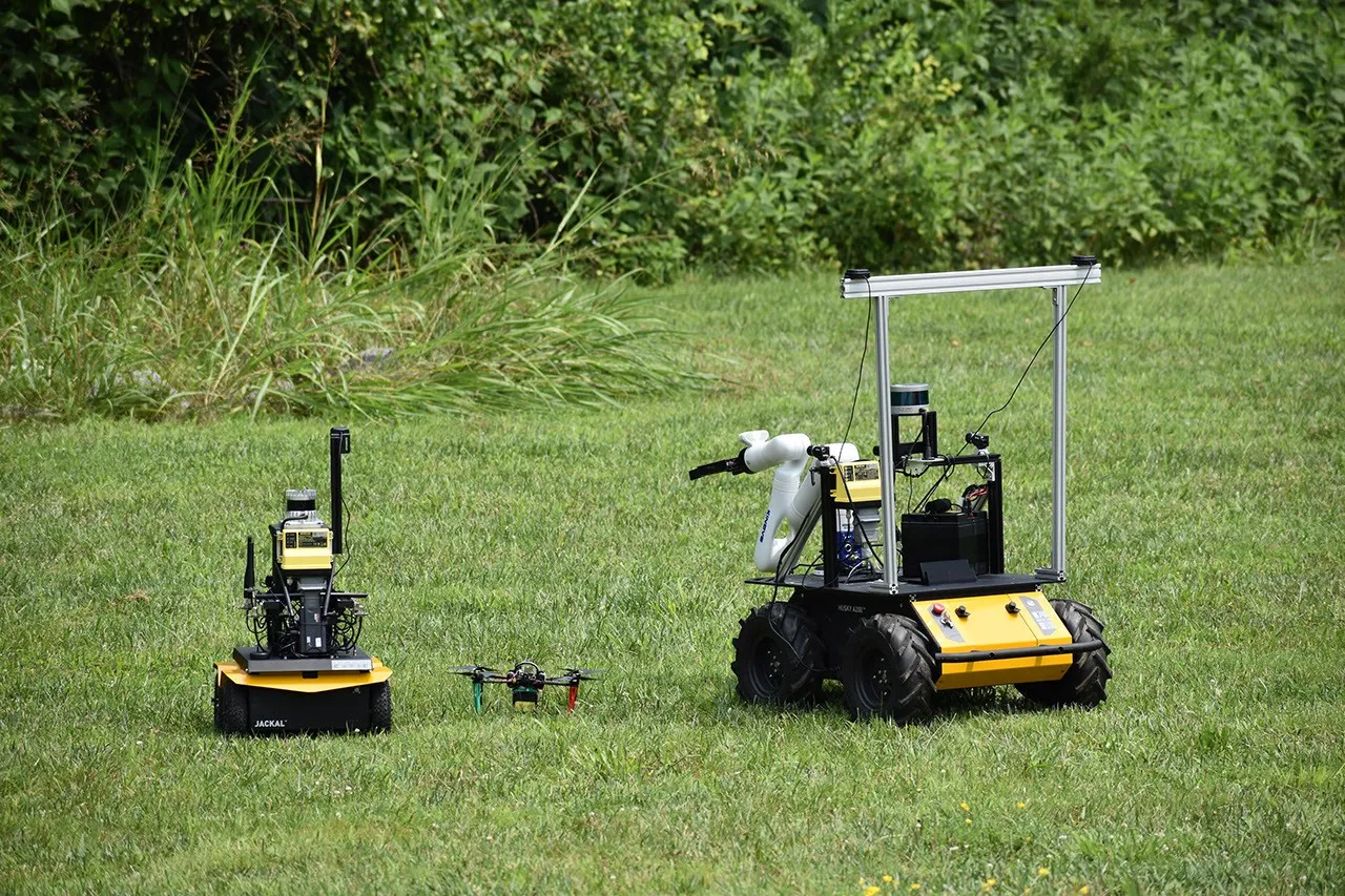 A drone and two rovers divide up tasks on their own in a NASA field test